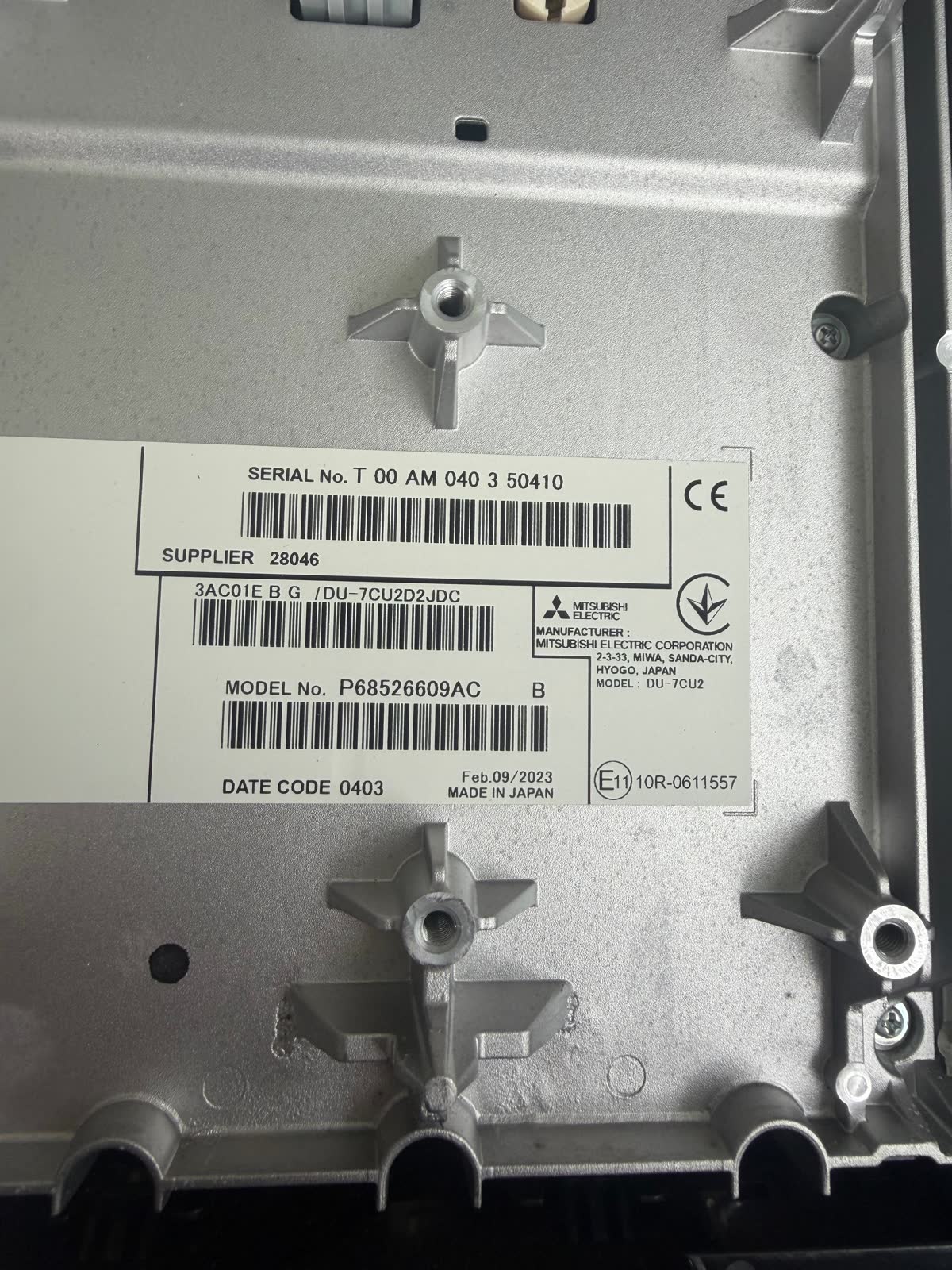 RAM Mitsubishi DU-7CU2 radio label with part number P68526609AC and the T00AM serial number